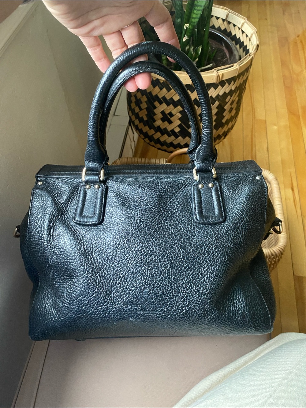 French luxury label Maison Pourchet black pebble leather bag